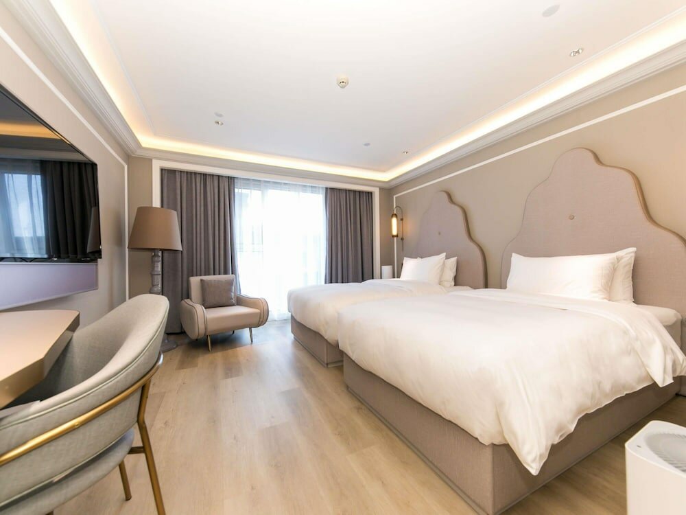 Фото Mercure Turpan Downtown