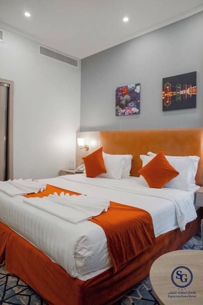 Фото Signature Guest Hotel