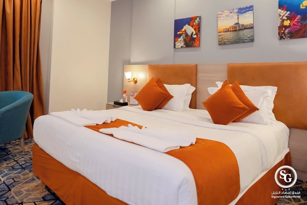 Фото Signature Guest Hotel