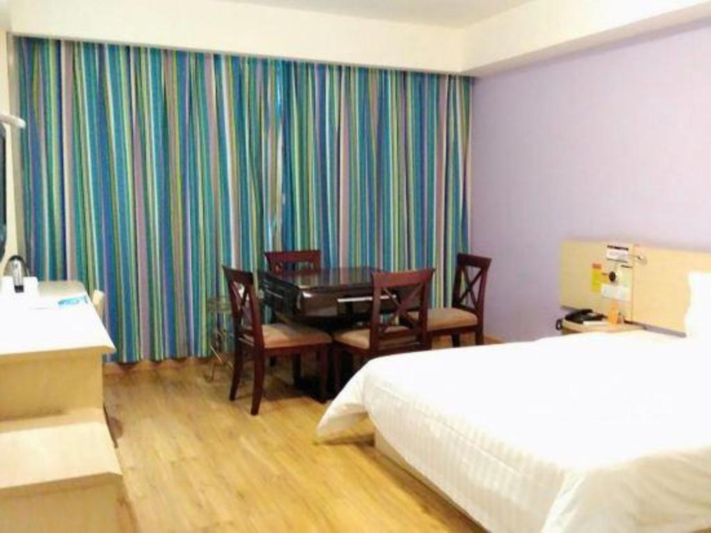 Фото 7Days Inn Chain Hotel Chongqing Wanzhou Gaosuntang Chongbai