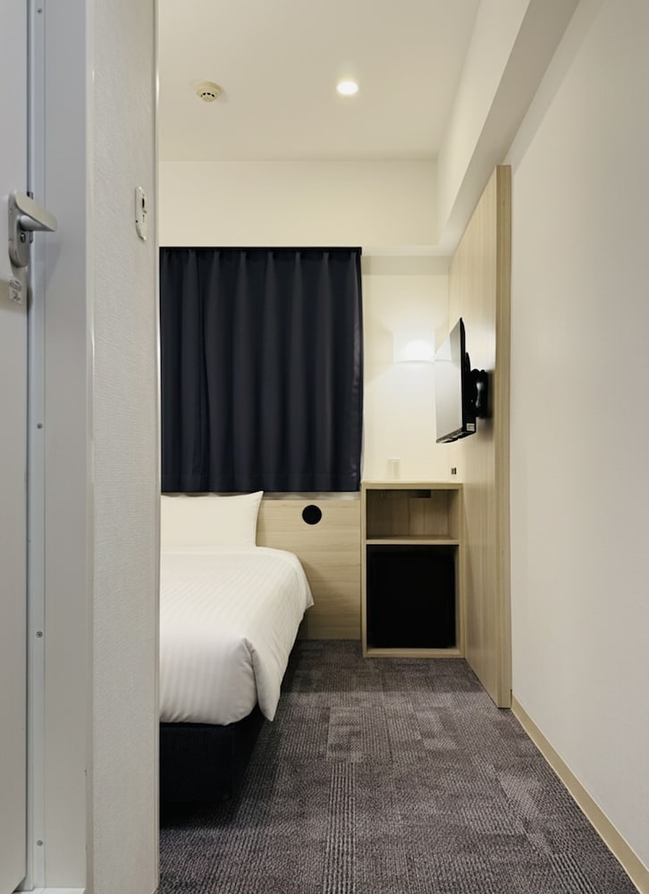Фото Hotel Mid In Meguro-Ekimae