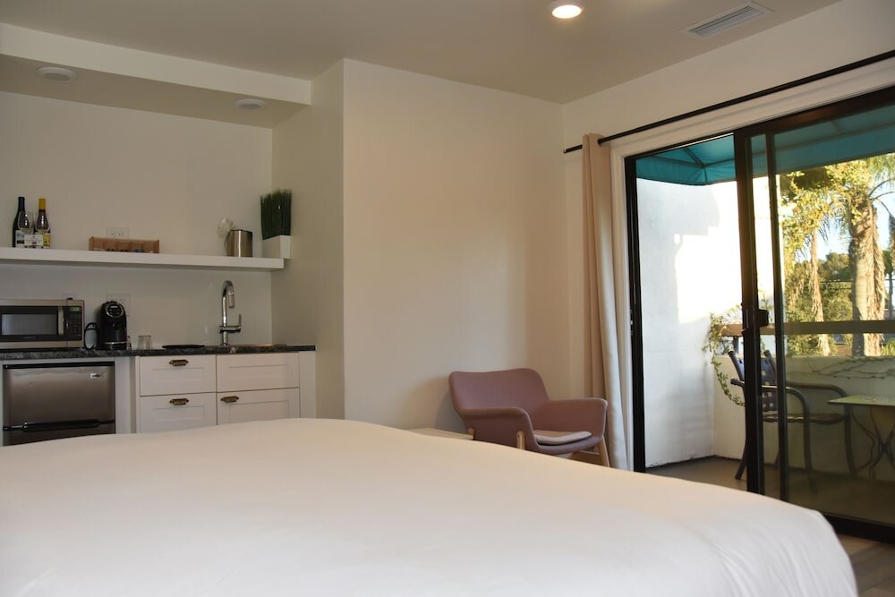 Фото Franciscan Inn & Suites