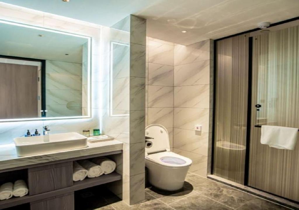 Фото Microtel by Wyndham Qingdao Huangdao