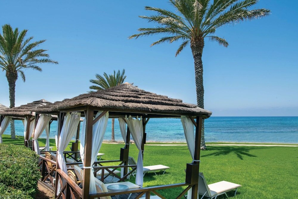 Фото Constantinou Bros Athena Beach Hotel