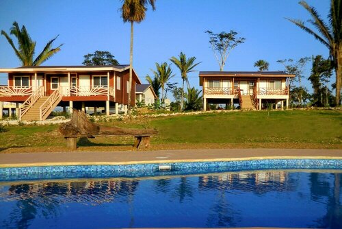 Гостиница Juntos Cottages в Кайо