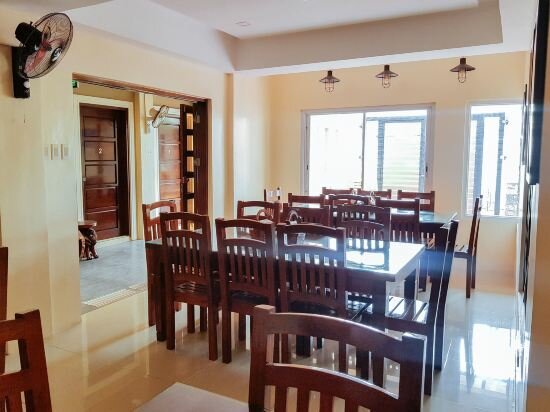 Фото RedDoorz @ Caimito Drive Dampas