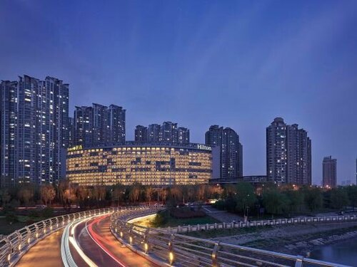 Внешний вид отеля Hilton Nanjing Riverside в Нанкине, фото 4