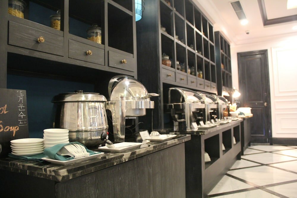 Фото Manoir Des Arts Hotel