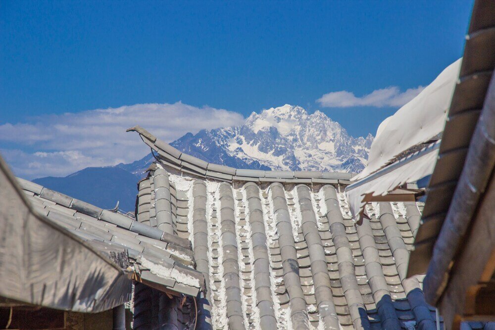 Фото Lijiang Xueshanyu Inn