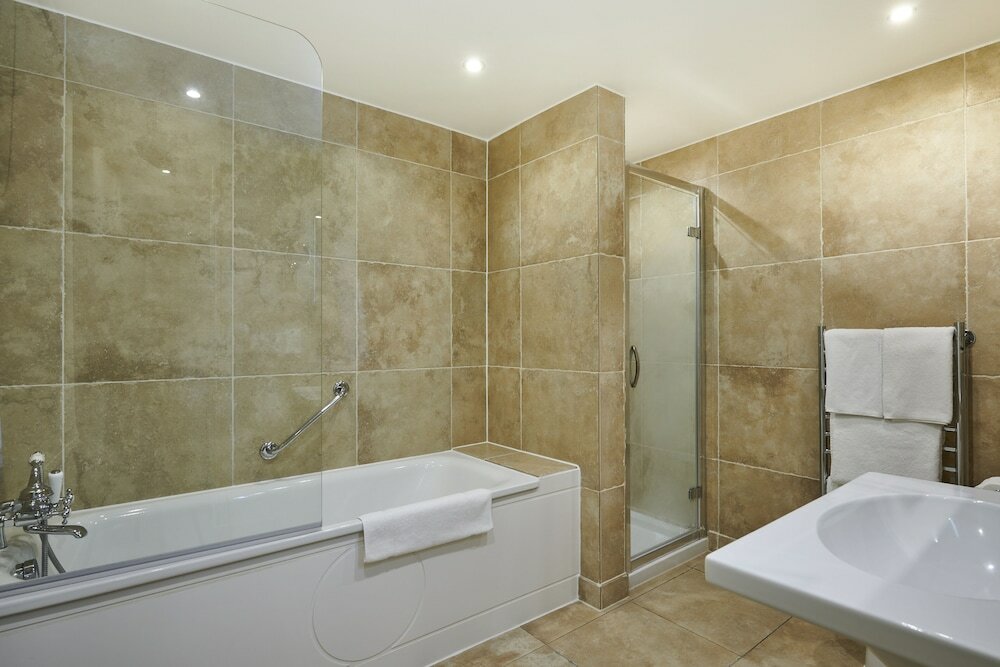 Фото Tophams Hotel