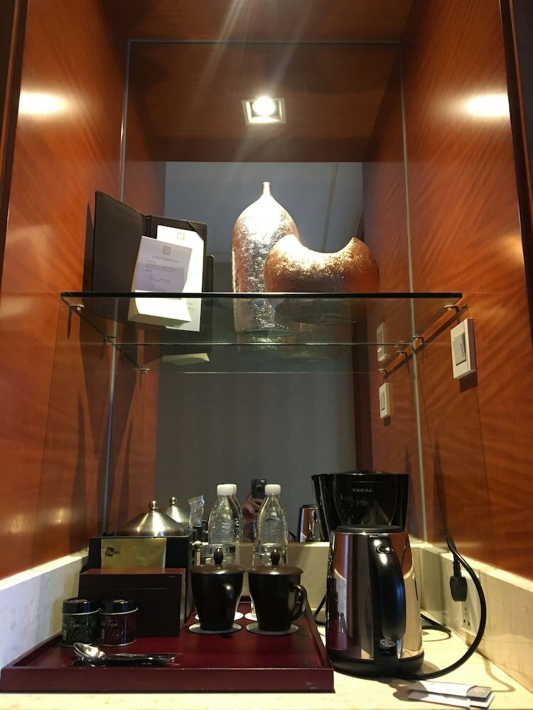 Фото Grand New Century Hotel Ninghai Jinhai