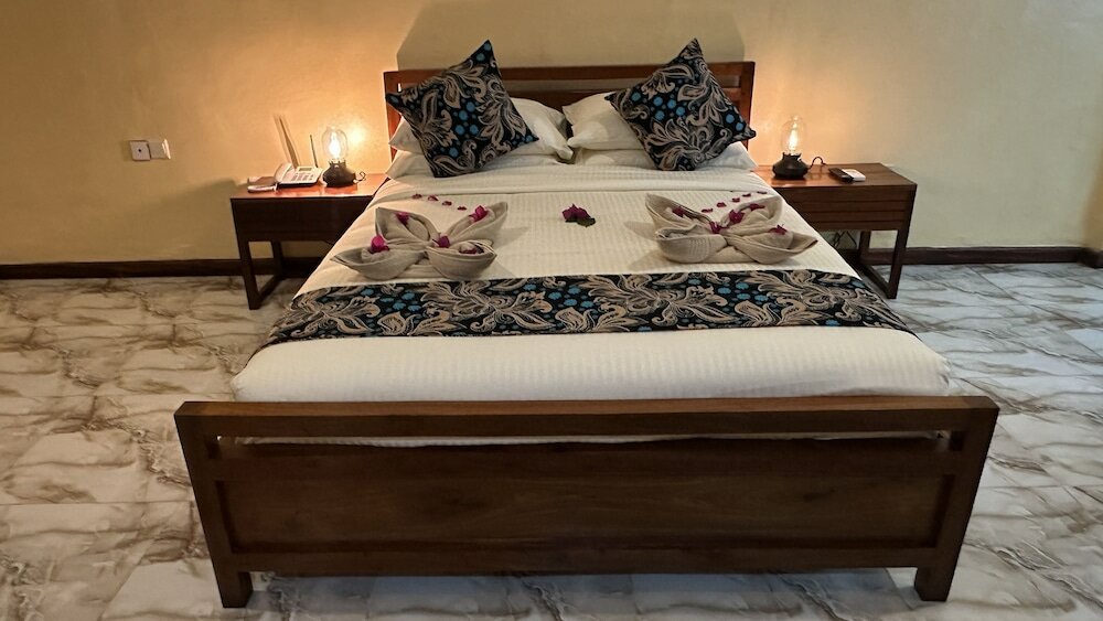 Фото Double A Nungwi Beach Hotel