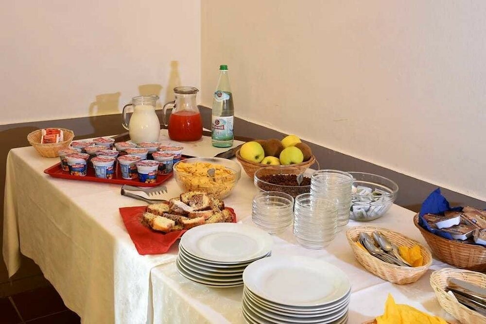 Фото Ostello Palazzo Pierantoni