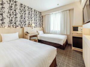 отель Nishitetsu Resort Inn Beppu
