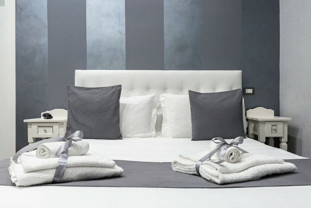 Фото Hotel Bella Napoli Suites