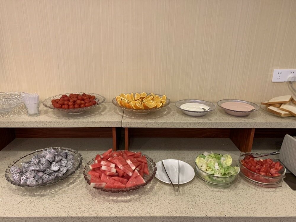 Фото Fujian Sunshine Holiday Hotel