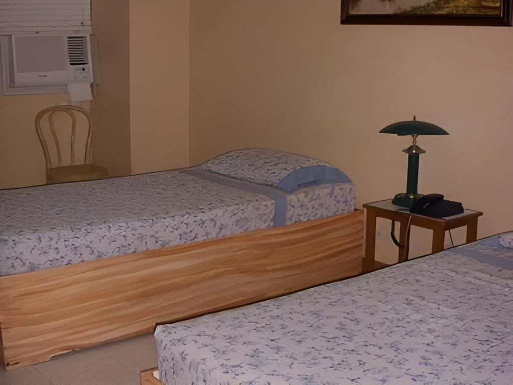 Фото Plaza Maria Luisa Suites Inn