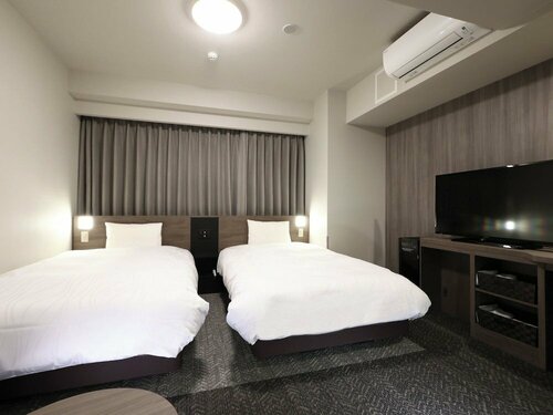 Гостиница Dormy Inn Okayama в Окаяме