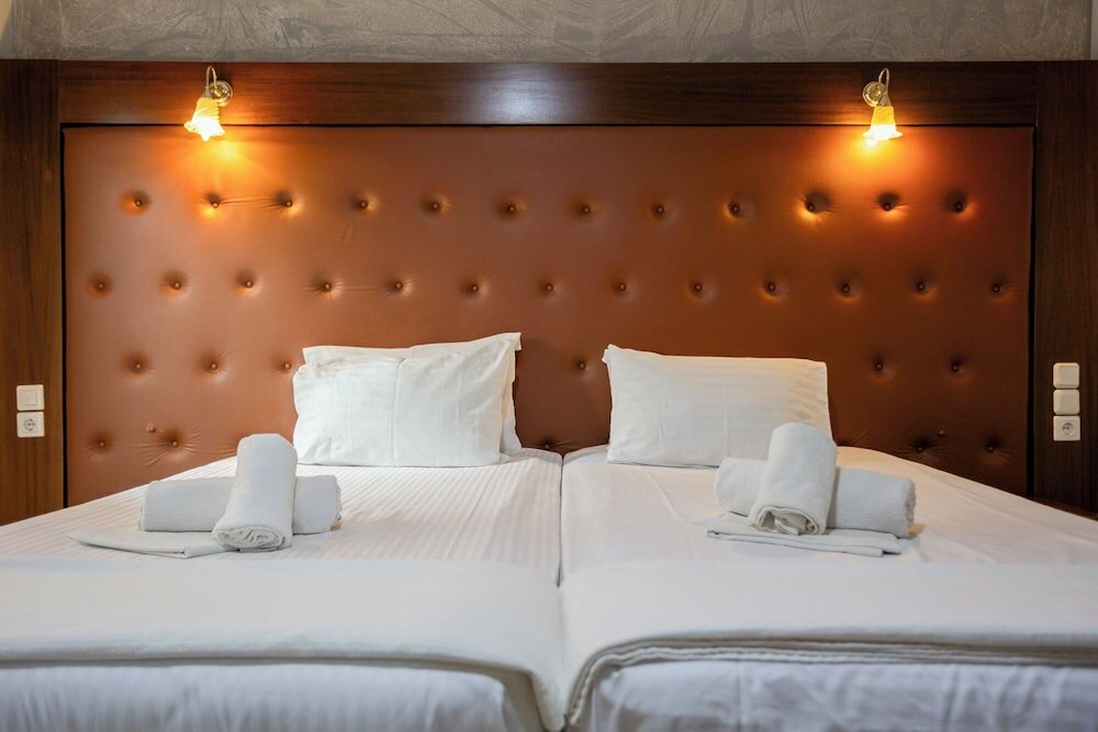 Фото Toti Boutique Rooms