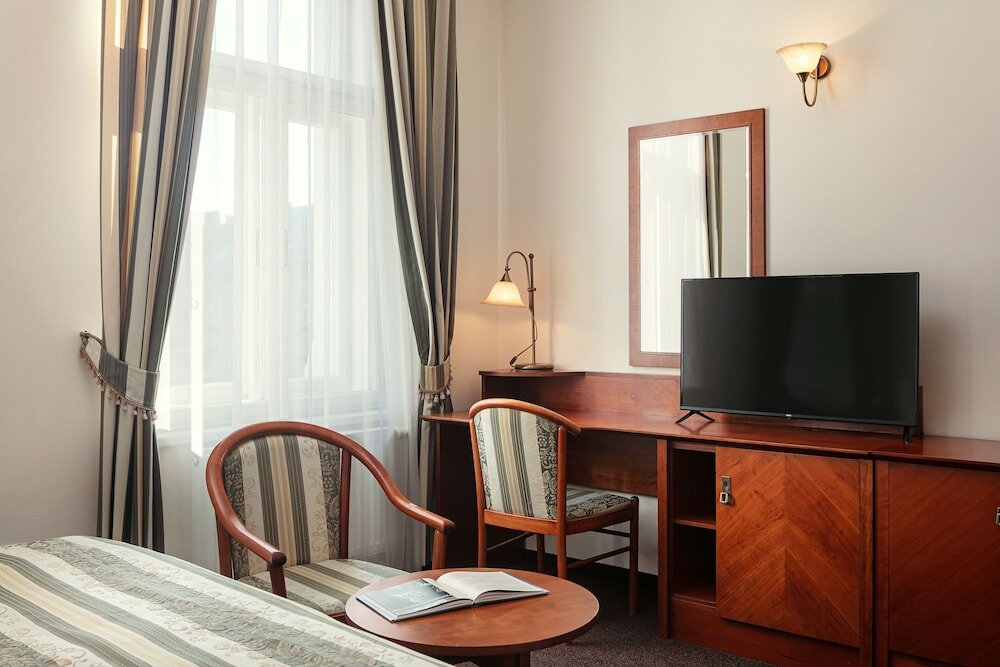 Фото Amigo City Centre Hotel