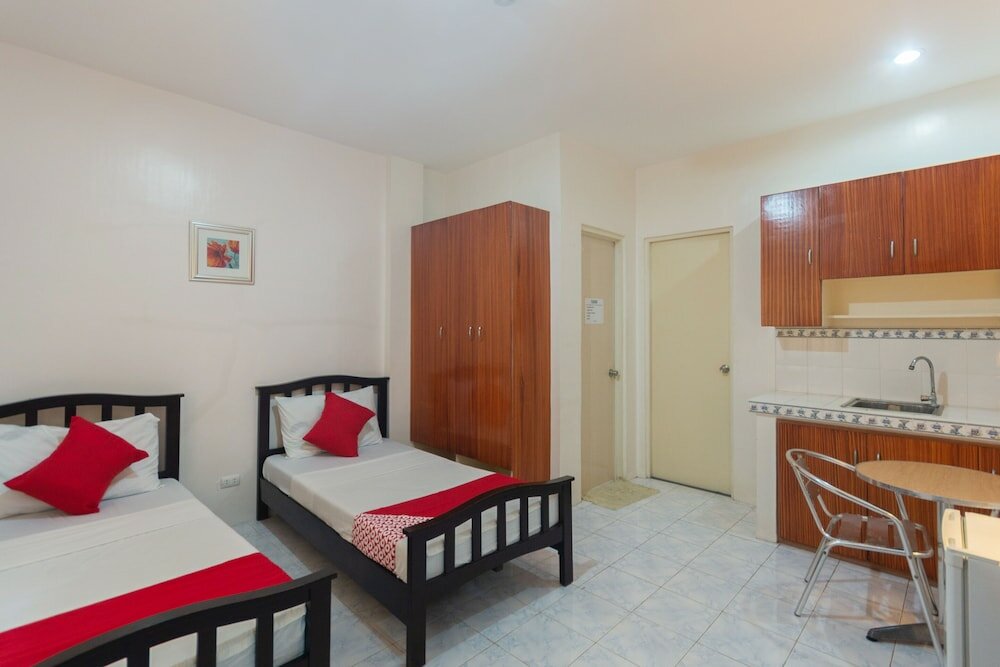 Фото Oyo 556 3j's And K Apartment