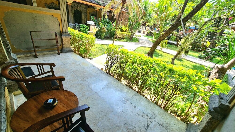 Фото Satriya Cottages