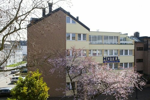 Гостиница Hotel am Düsseldorf Platz в Ратингене