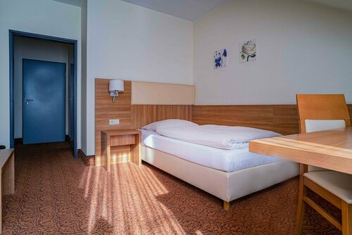 Гостиница Hotel am Stadtpark в Лангенфельде