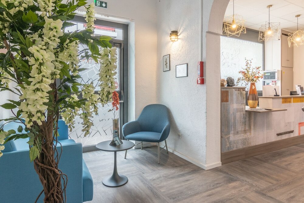 Фото The Alcove Hotel