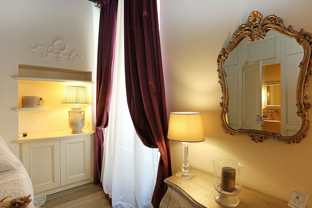 Фото Piazzetta de' Monti Suites