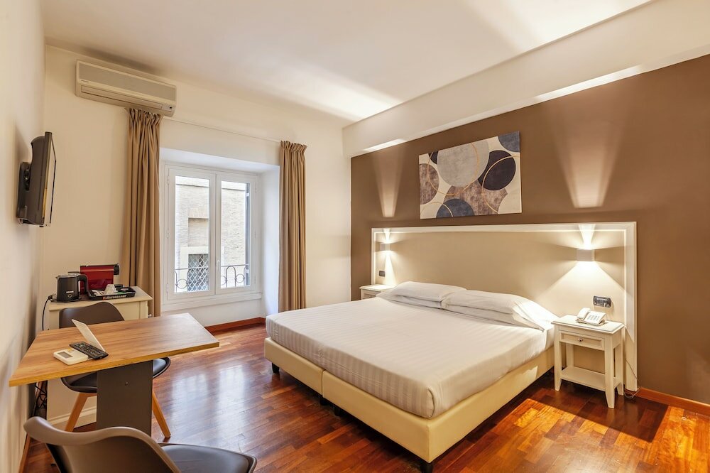 Фото Inn Rome Rooms & Suites