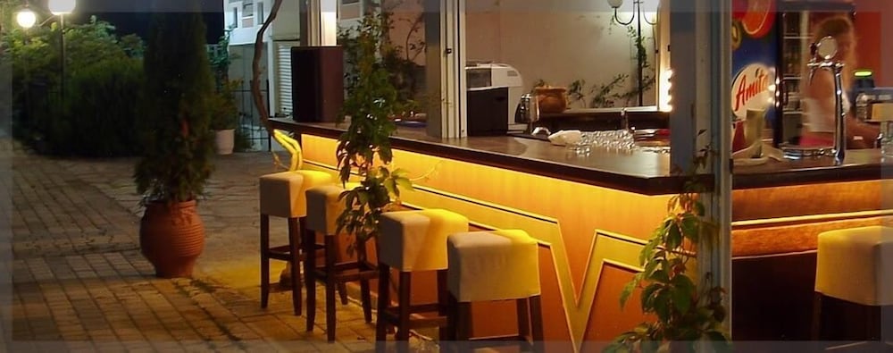 Фото Xenios Dolphin Beach Hotel