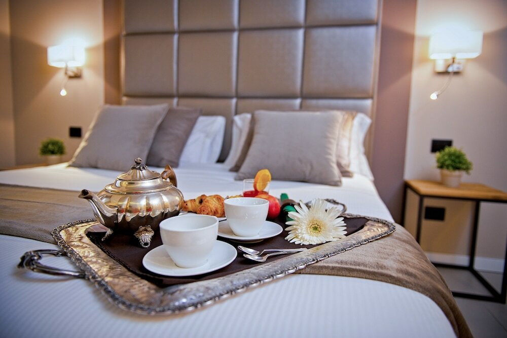 Фото Delle Vittorie Luxury Suites & Rooms