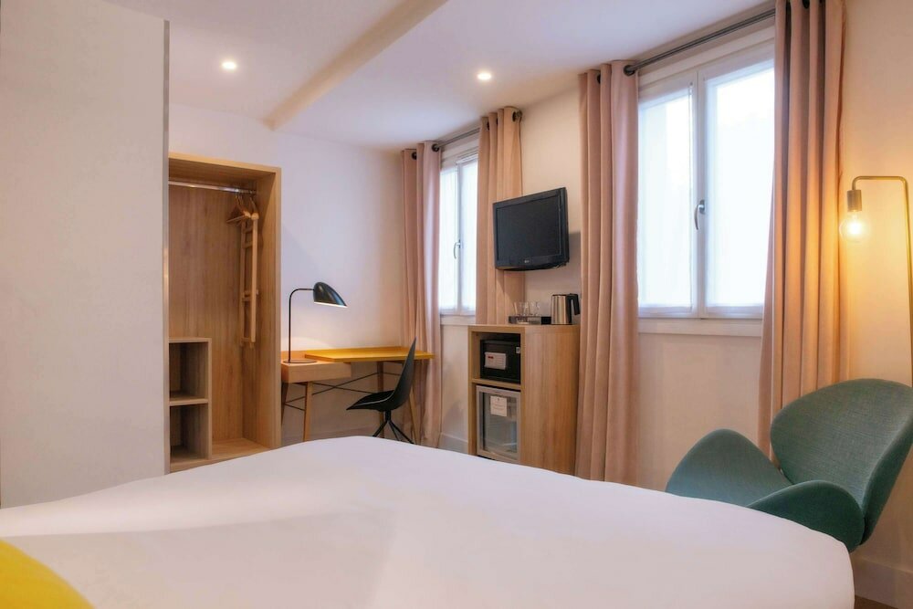 Фото Hotel Arc de Triomphe