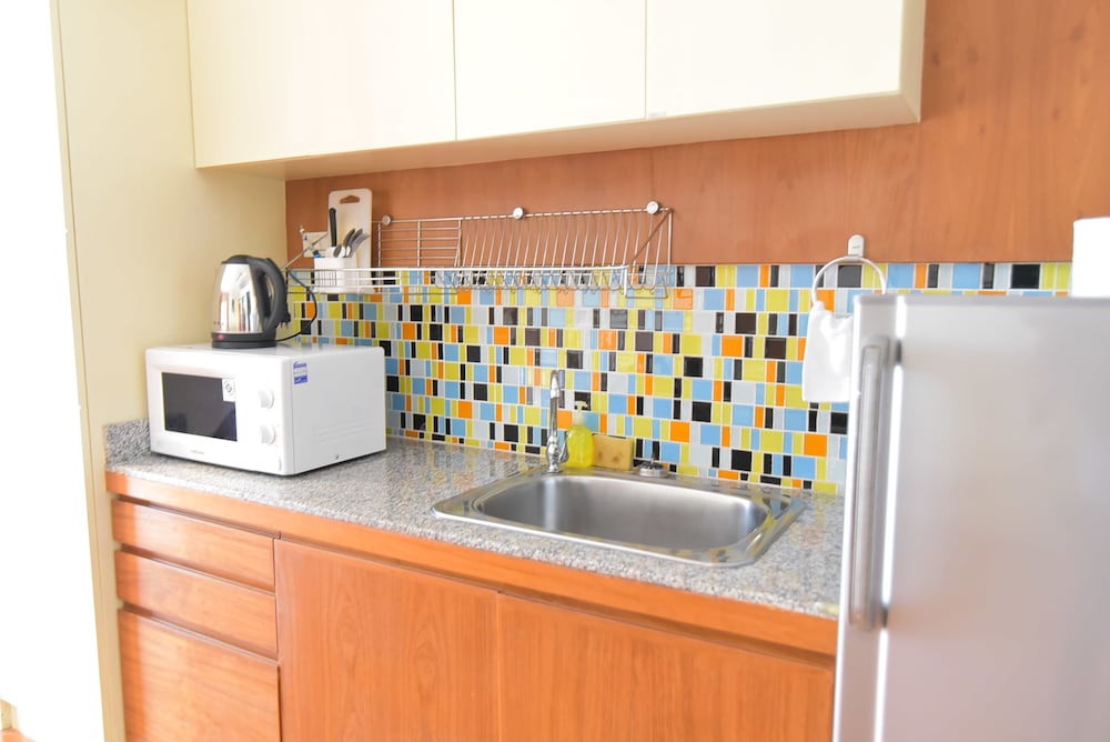 Фото Eight Ville Apartment