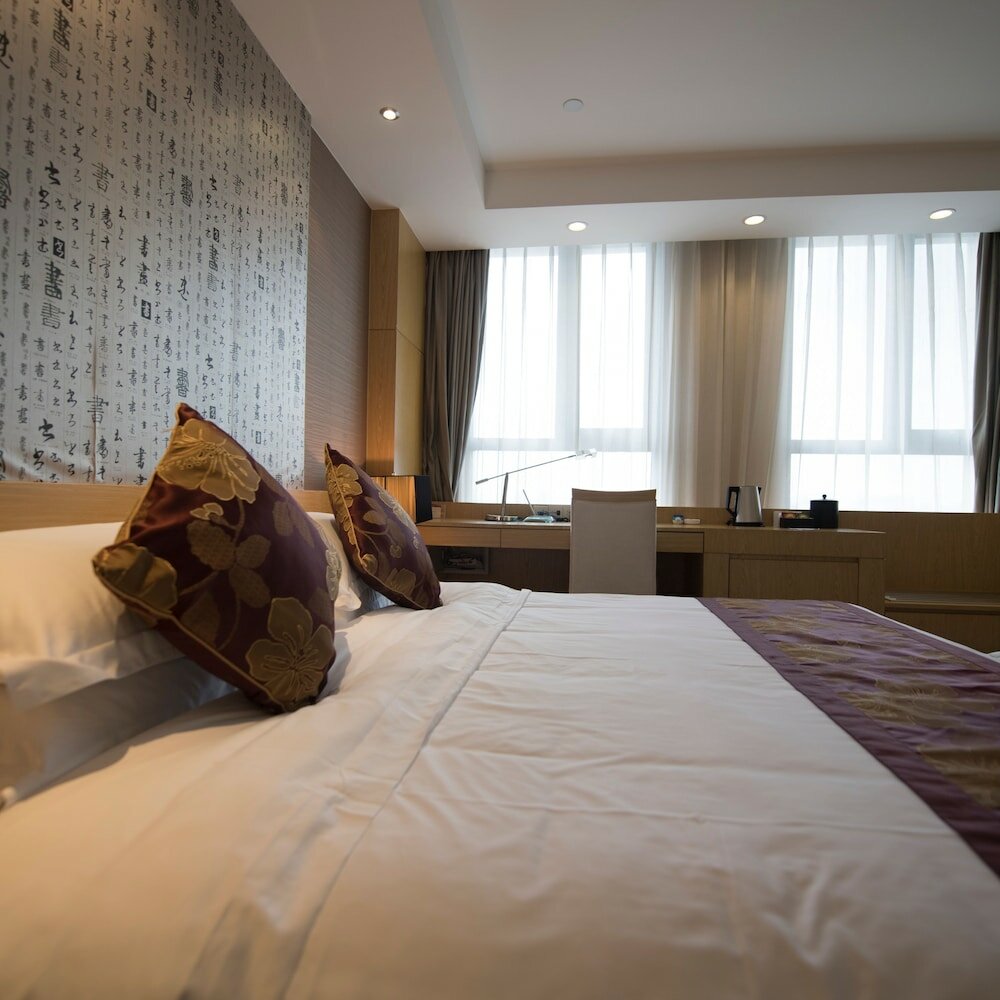 Фото Suzhou Sun Plaza Hotel