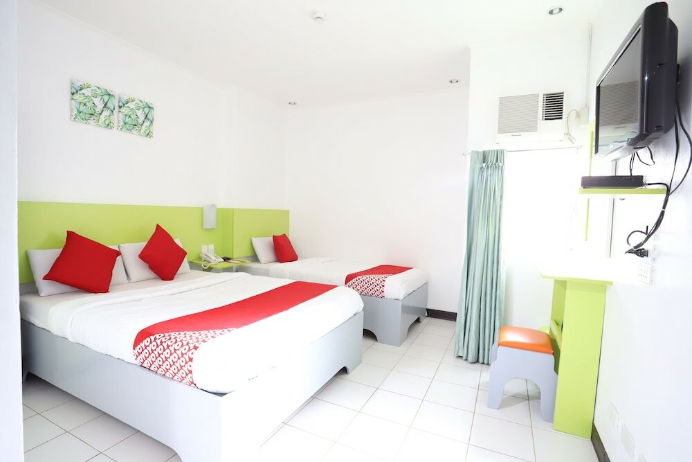 Фото Oyo 210 Apple Tree Suites