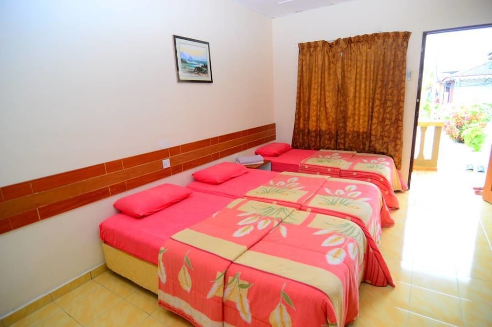 Фото Purnama Beach Resort