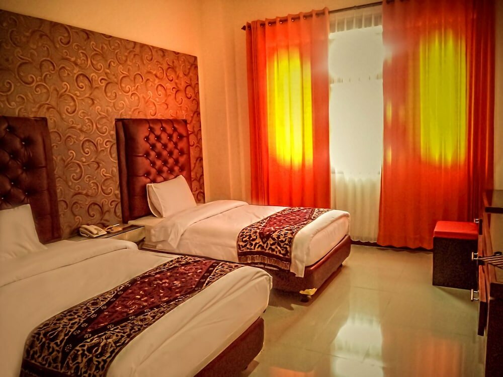 Фото Grand City Batu Hotel