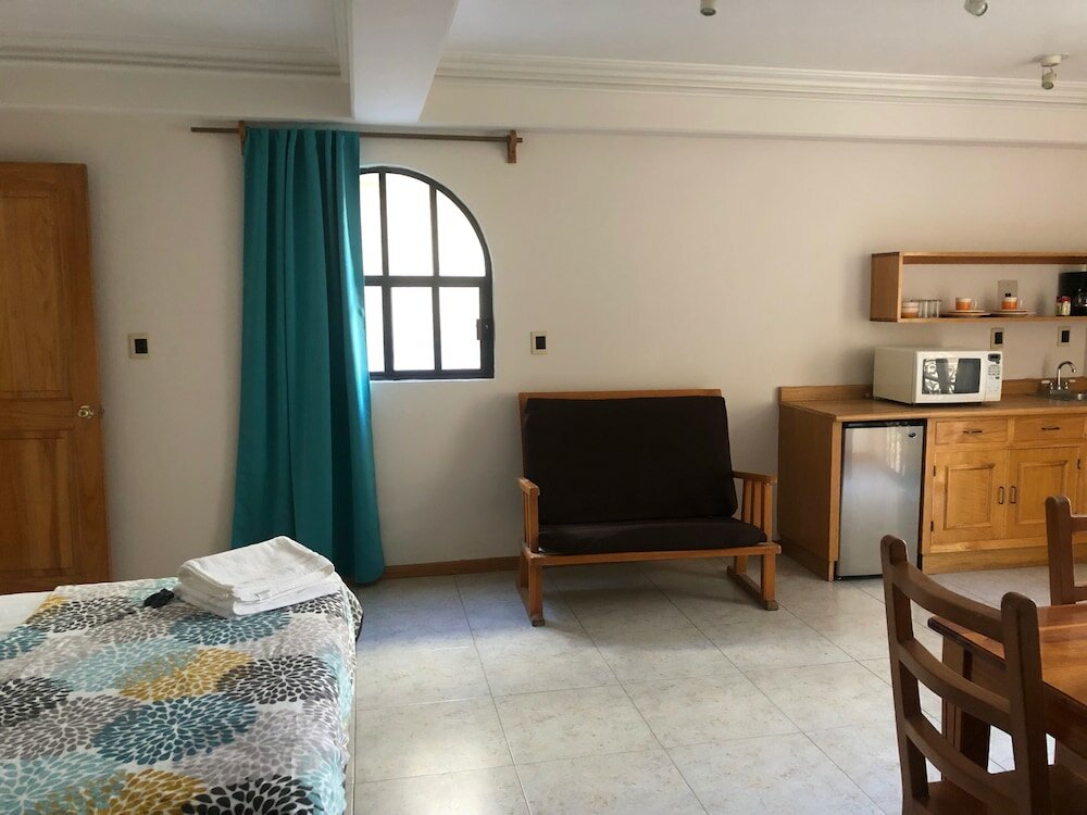 Фото Suites Sevilla