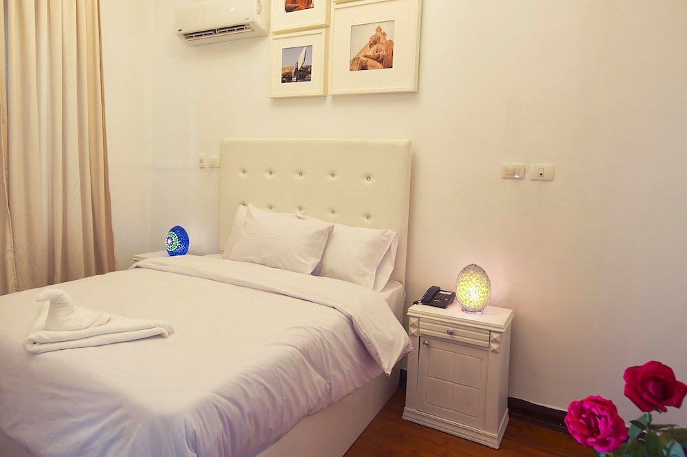 Фото Tahrir Plaza Suites