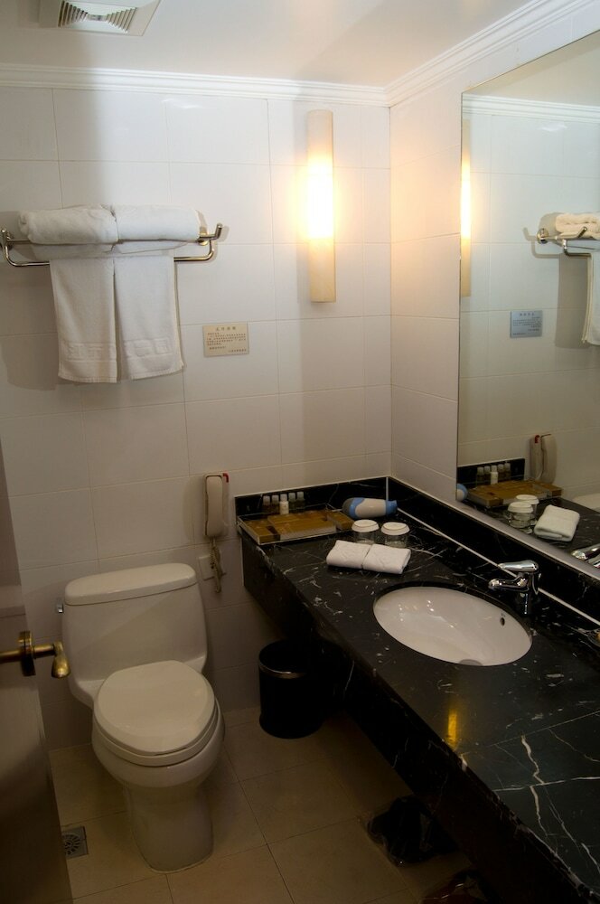 Фото Yishiyuan Hotel