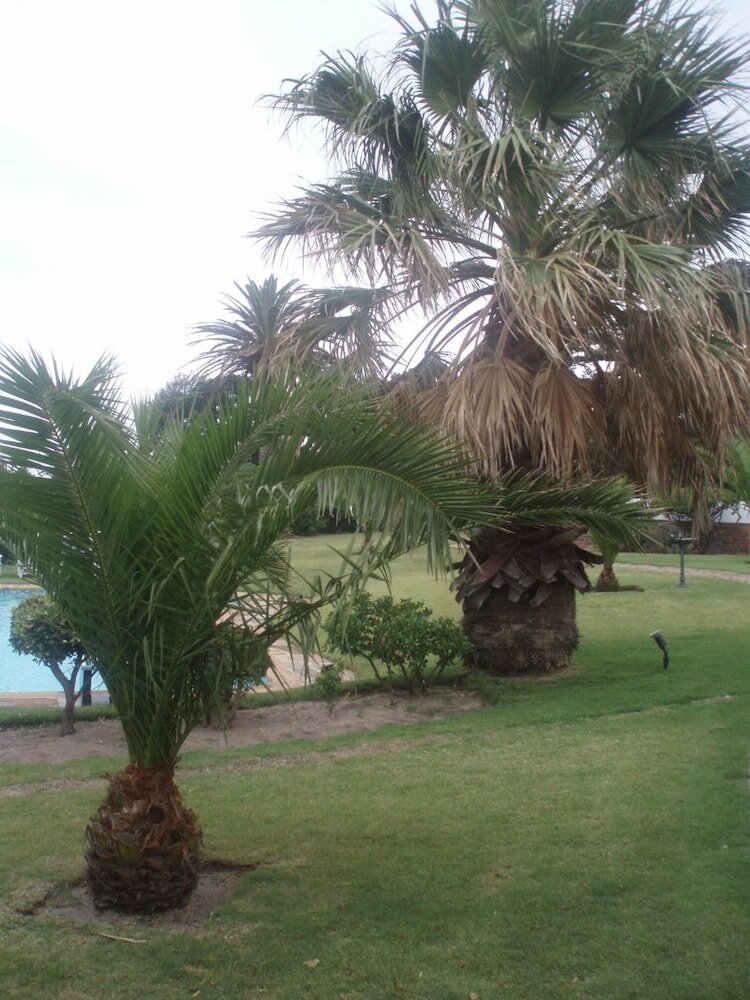 Фото The Sanctuary Guest House Estate