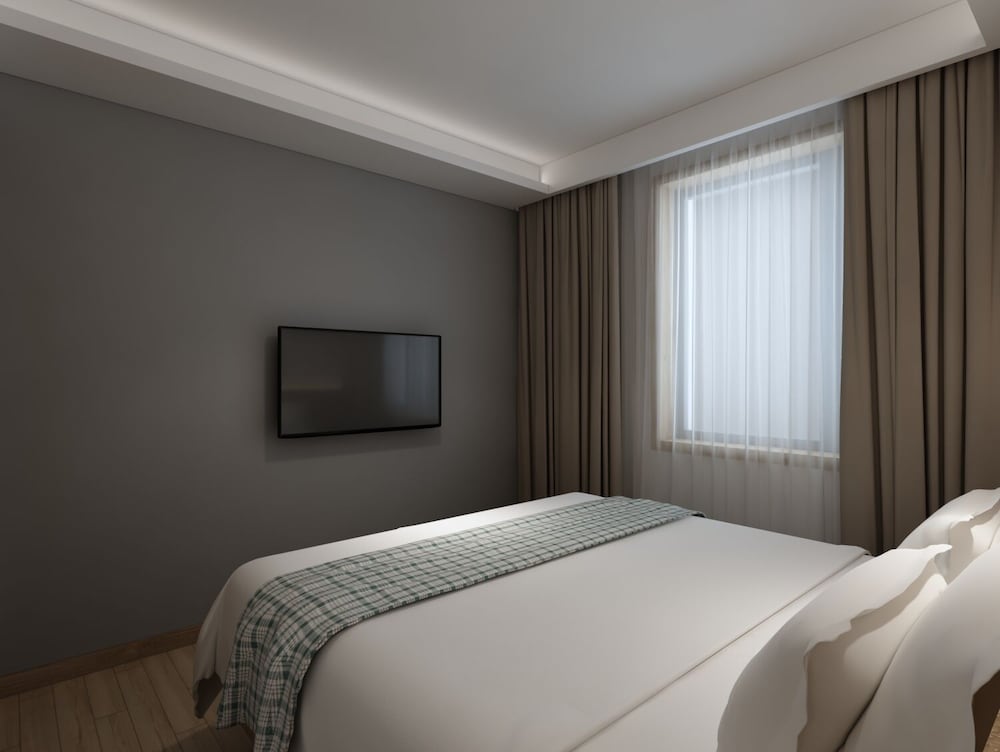 Фото Happy Dragon Saga Hotel (Beijing Tiananmen Wangfujing)