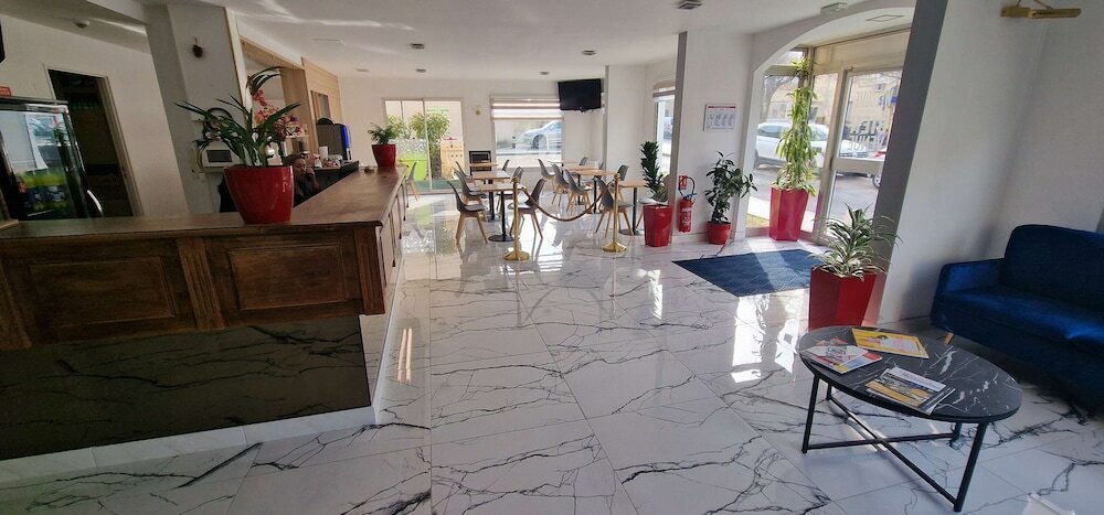 Фото Kyriad Direct Arpajon