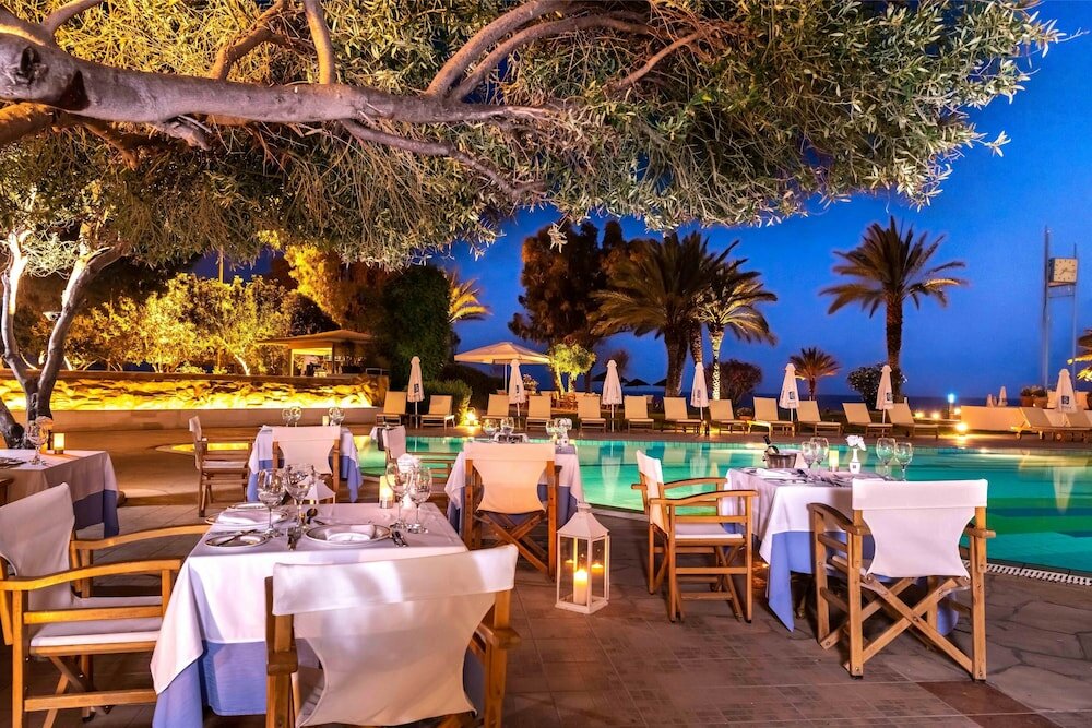 Фото Constantinou Bros Athena Royal Beach Hotel