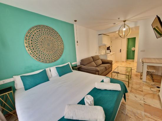 Фото Hotel y Apartamentos Doña Lola