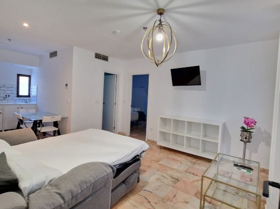 Фото Hotel y Apartamentos Doña Lola