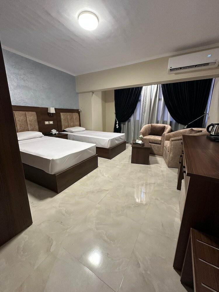 Фото Aura Inn Hotel Cairo