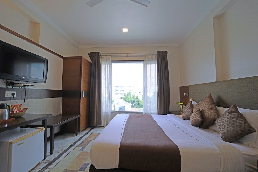 Фото Amantra Comfort Hotel